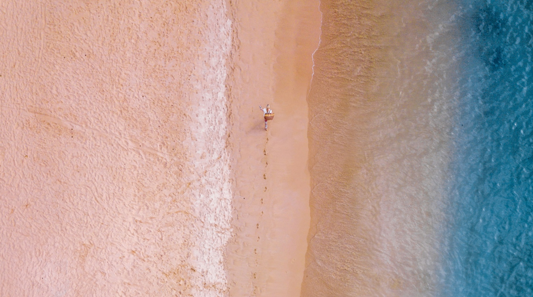 woman walking on beach