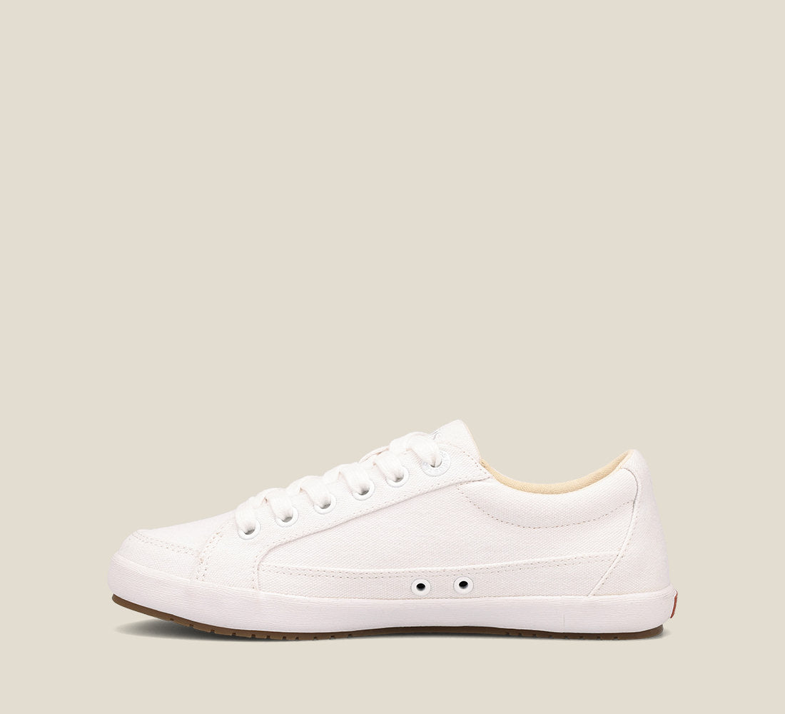 "Side image of Moc Star 2 White Canvas sneaker with laces, Curves & PodsÂ® polyurethane removable footbed with Soft Supportâ„¢, and durable, flexible rubber outsole."