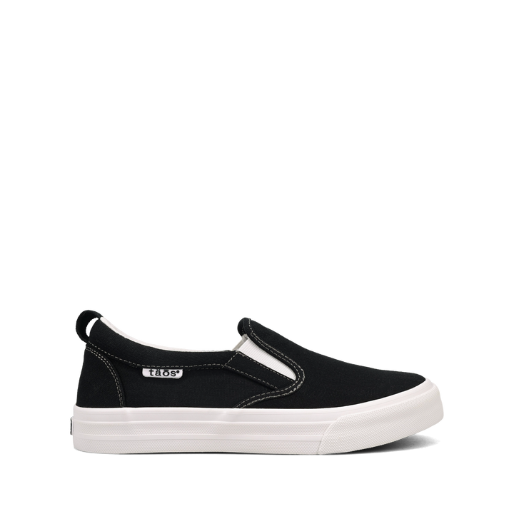 Side angle image of Taos Footwear Rubber Soul Black/White Canvas Size 6