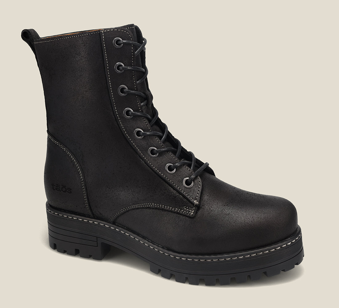 Hero image of Groupie Black Rugged boot with removable outsoles & an inside zipper lace-up adjustability.