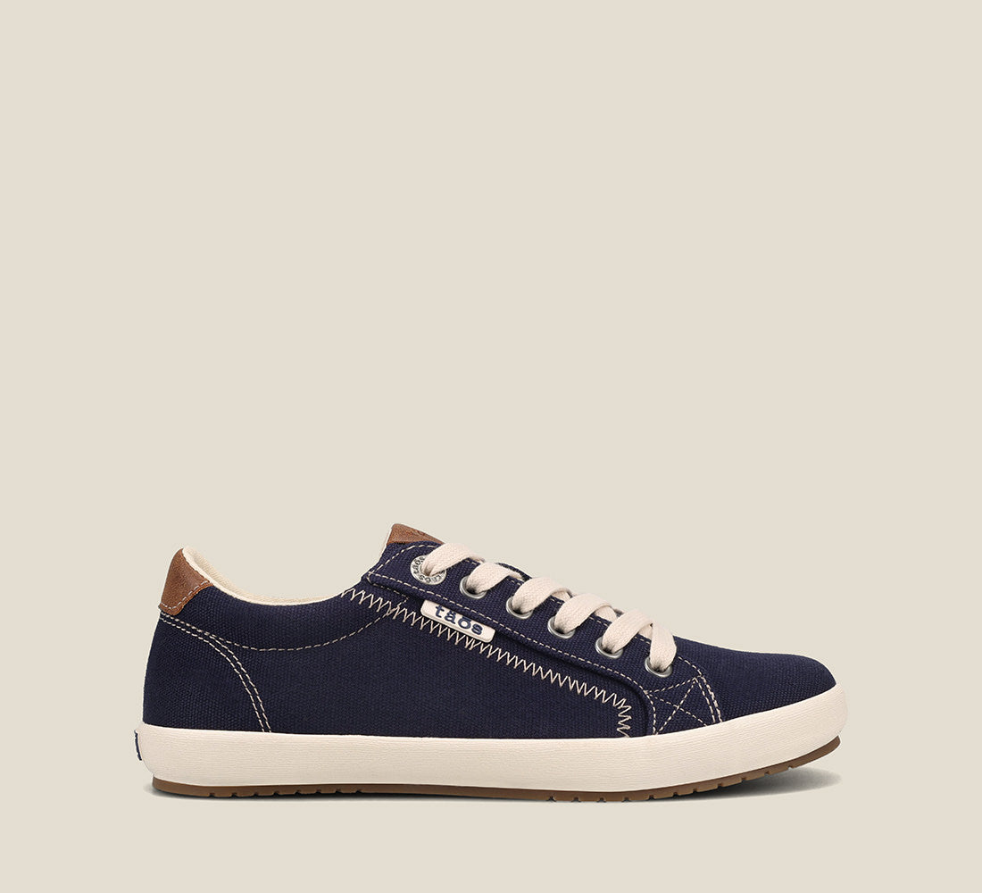 Instep of Star Burst Navy/Tan Canvas sneaker withÃ‚Â fabricatedÃ‚Â leather trim,polyurethane removable footbed with rubber outsole 6