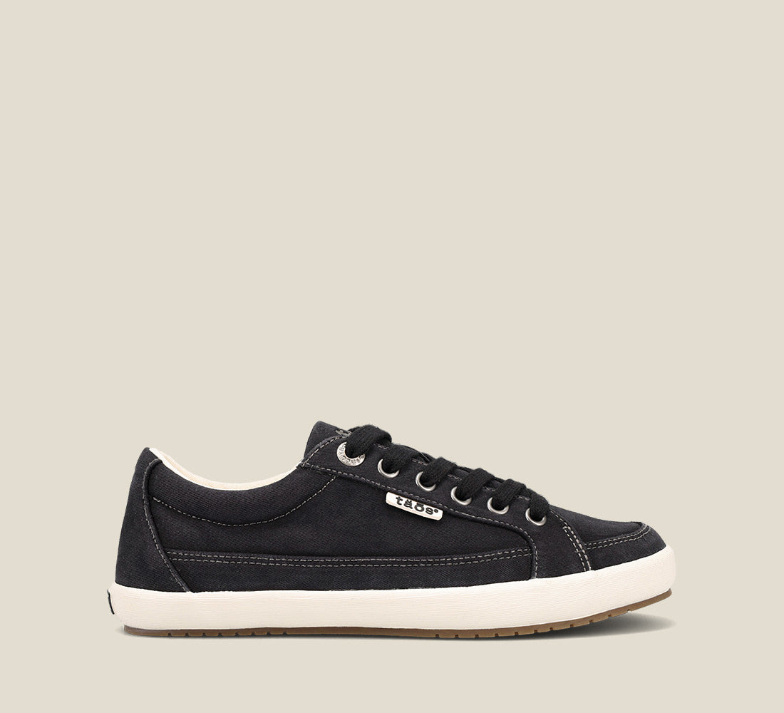 "Side image of Moc Star 2 Black Distressed Canvas sneaker with laces, Curves & PodsÂ® polyurethane removable footbed with Soft Supportâ„¢, and durable, flexible rubber outsole."