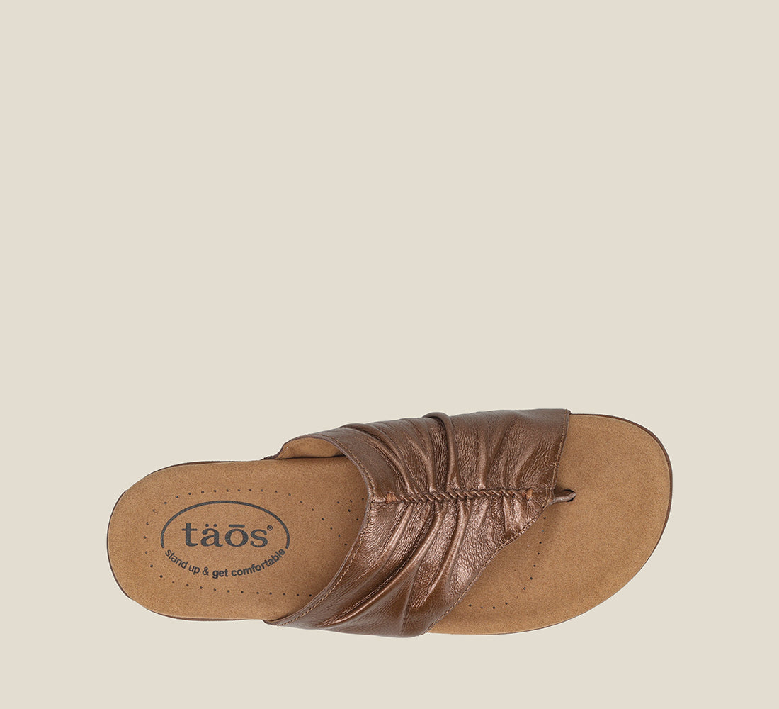 Top down angle of Gift 2 Bronze leather slide on sandal with soft leather upper material - size 6