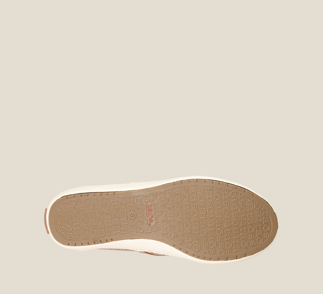 outsole image of Court Caramel slip on sneaker with perforations and rubber outsole..