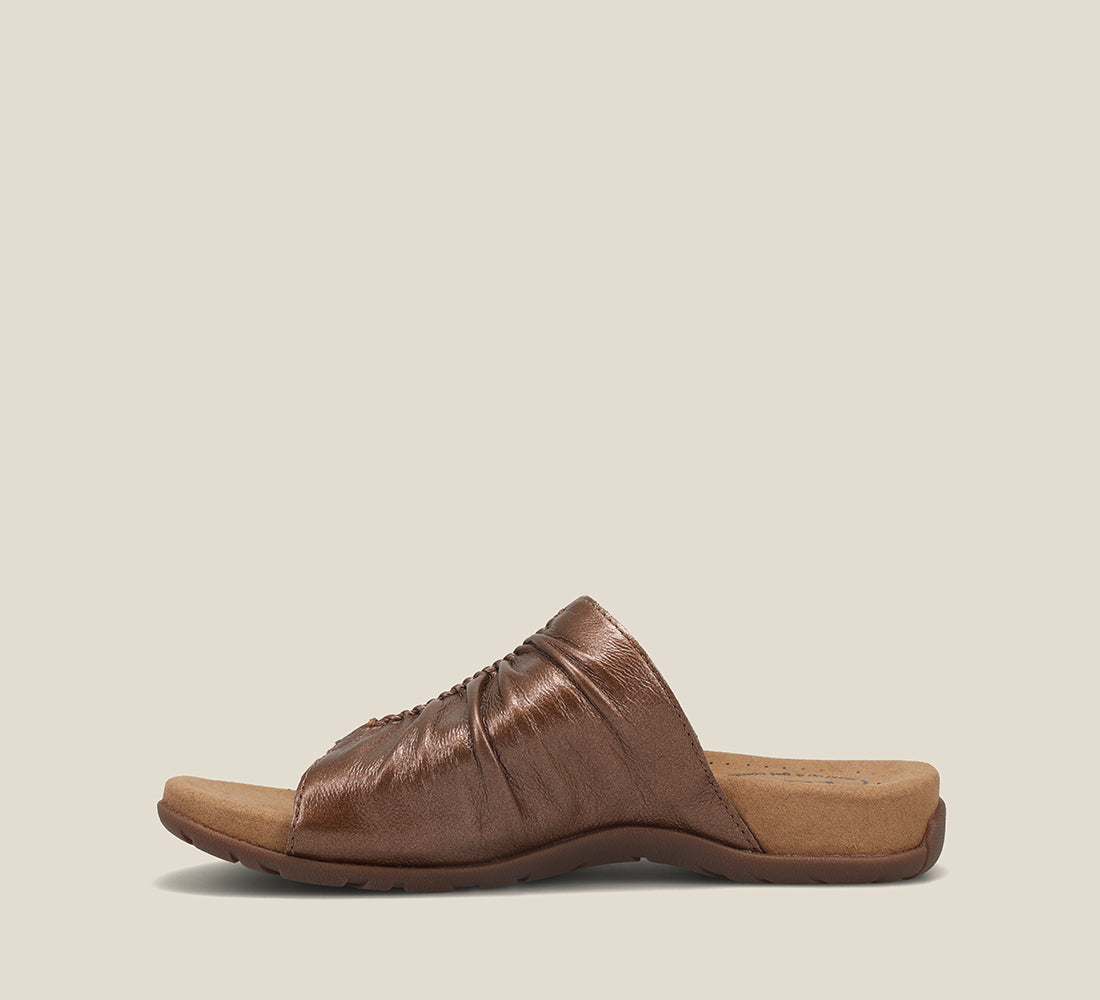 Outside angle of Gift 2 Bronze leather slide on sandal with soft leather upper material - size 6