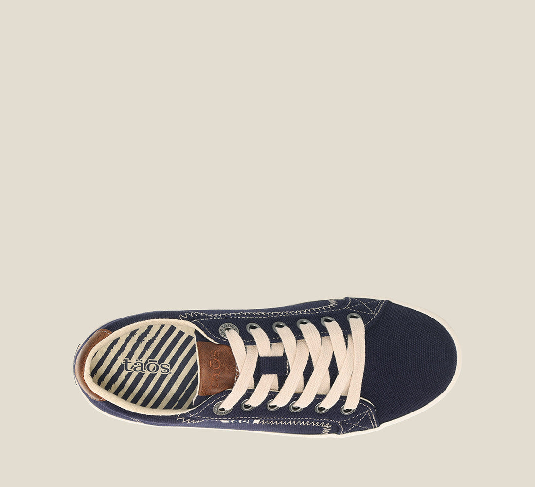 Top down Angle of Star Burst Navy/Tan Canvas sneaker withÃ‚Â fabricatedÃ‚Â leather trim,polyurethane removable footbed with rubber outsole 6