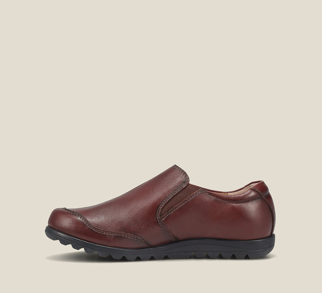Outsole image of Blend Whiskey Casual leather step-in shoe with medial gore & bungie closures & a removable footbed.
