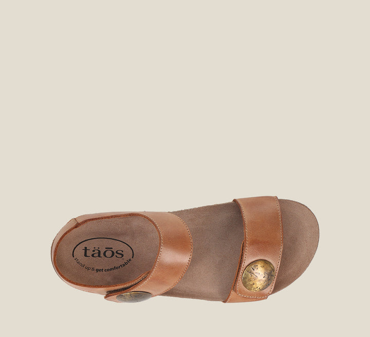 Top Angle of Luckie Caramel Casual leather sandal with pounded medallions hook and loop straps and cork- footbed.