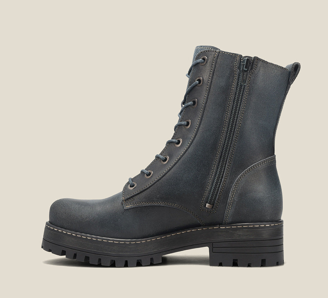 Outsole image of Groupie Dark Blue Rugged boot with removable outsoles & an inside zipper lace-up adjustability.