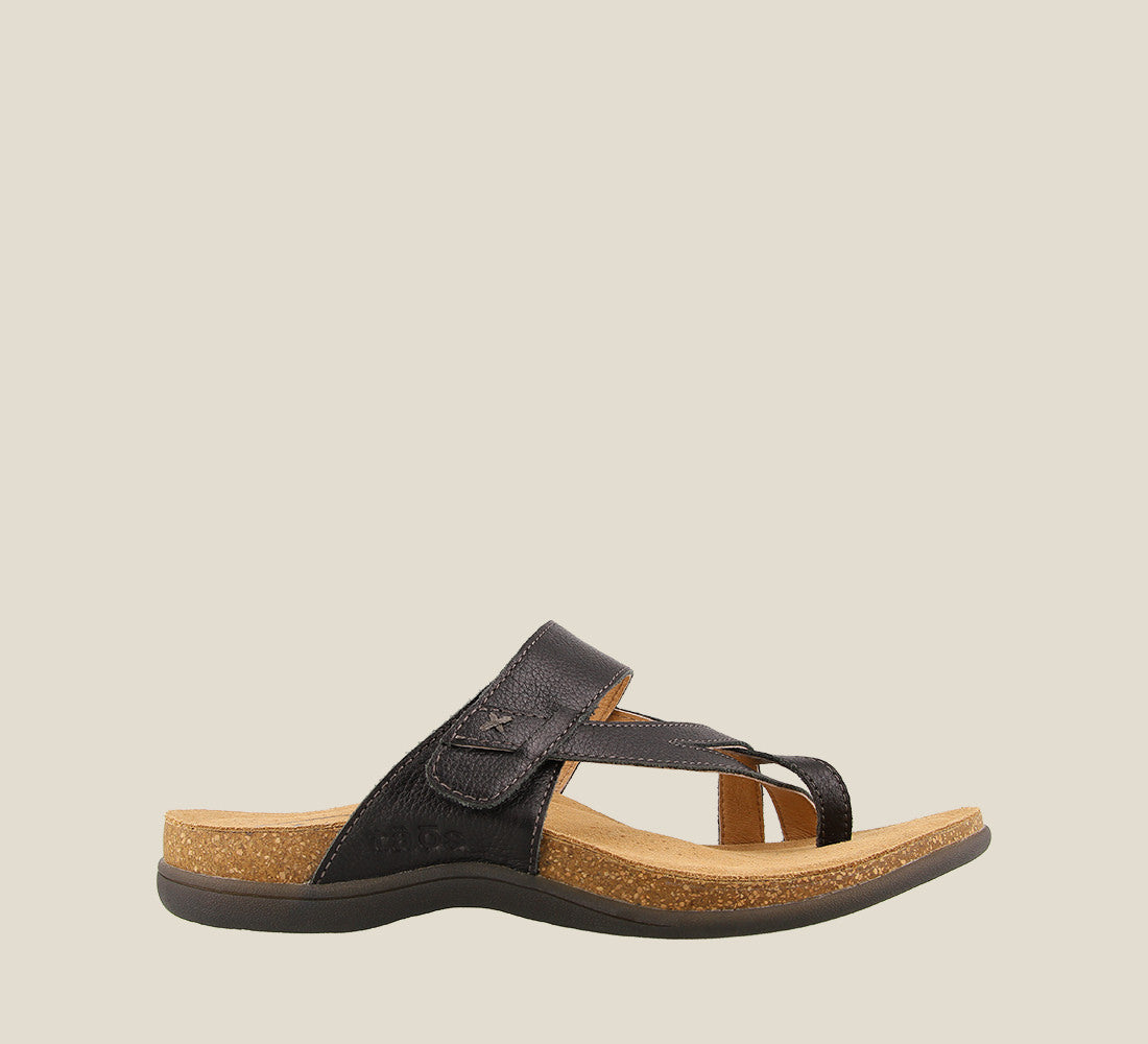 Outside angle of Perfect Black Slide sandal on our cork footbed featuring an adjustable strap and rubber outsole. - size 6