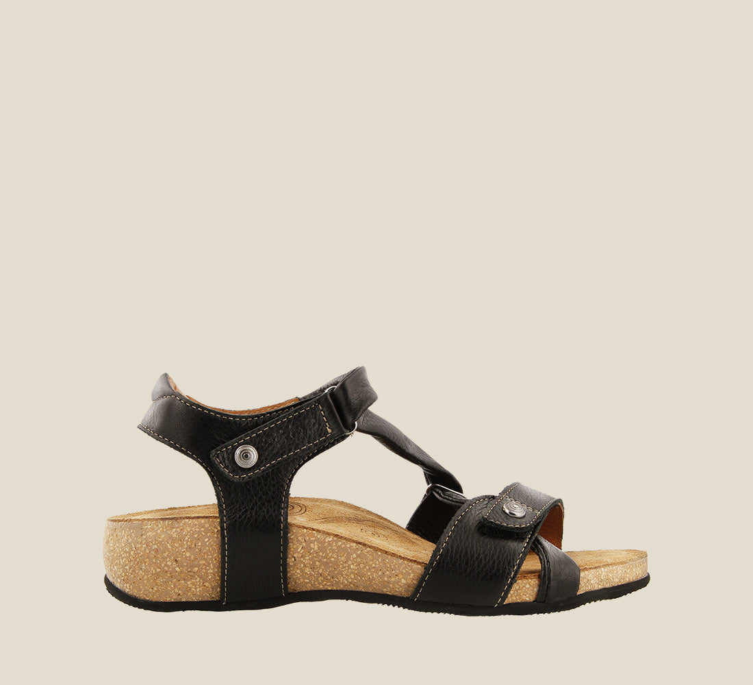 Outside angle of Universe Black adjustable leather sandal with two hook and loop straps lightweight cork footbed. Featuring hardware embellishments and a rubber outsole. - size 36