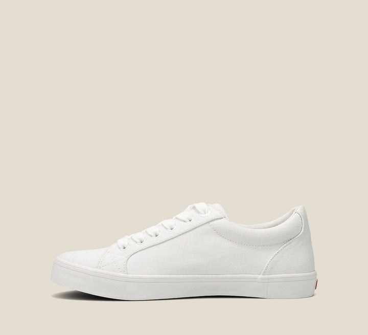 Inside angle of Starsky White Canvas Men's canvas lace up sneaker featuring a Curves & Pods removable footbed with Soft Support and rubber outsole.