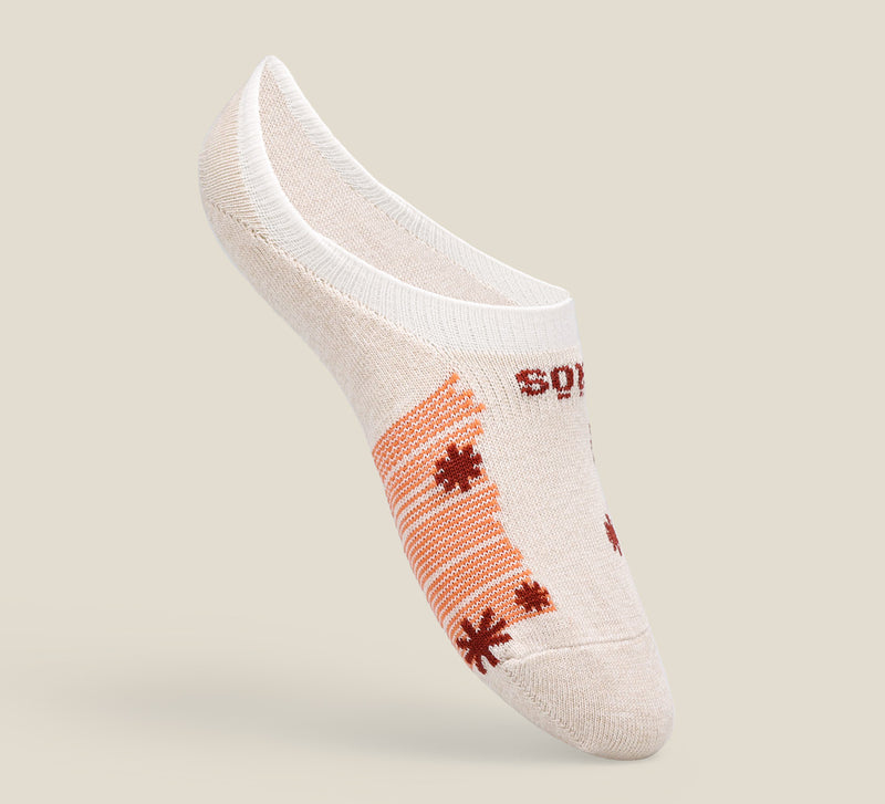 Hero image of now show taos socks in white and peach.