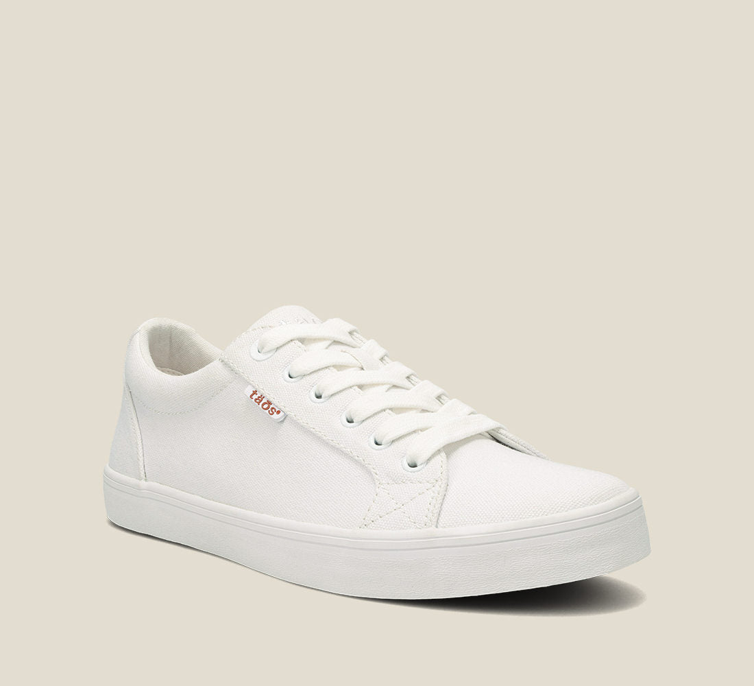 3/4 Angle of Starsky White Canvas Men's canvas lace up sneaker featuring a Curves & Pods removable footbed with Soft Support and rubber outsole.