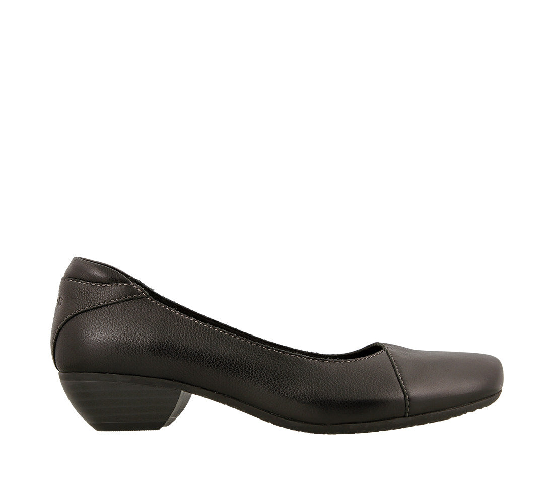 Outside angle of Black leather slip on women's casual shoe featuring removable footbed and rubber outsole - size 6