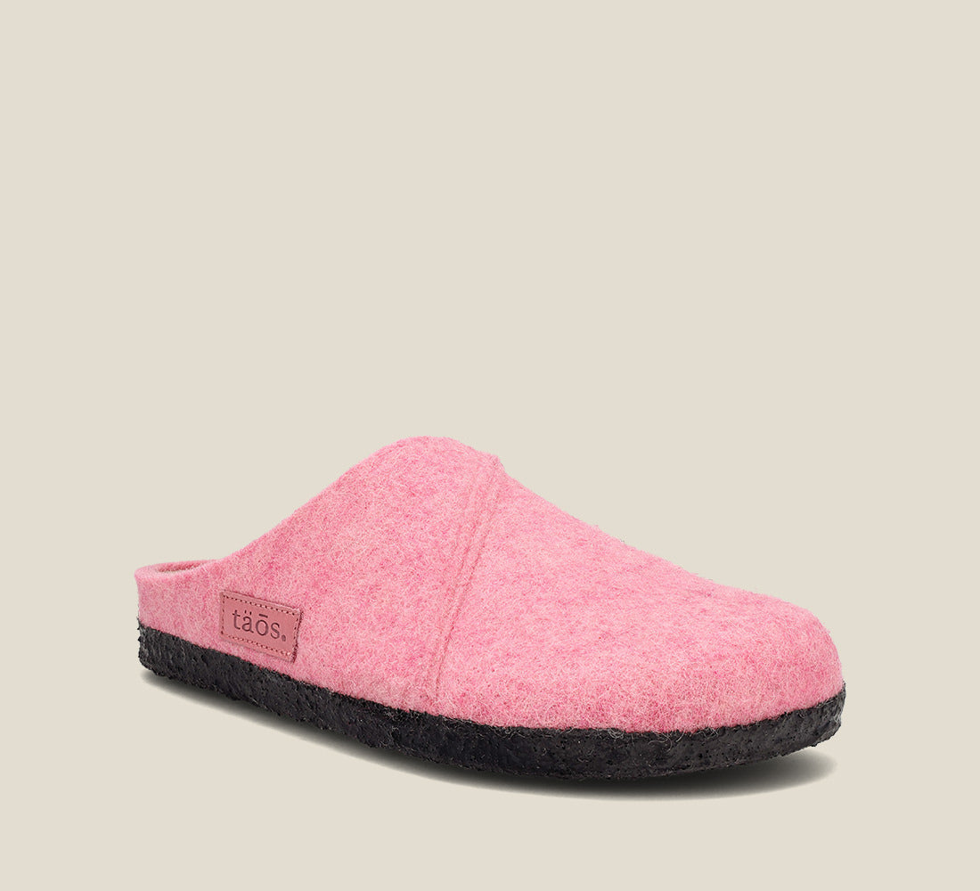 "Hero image of Wooled Class Pink clog with featuring a removable footbed with arch & metatarsal support, & TR outsole."