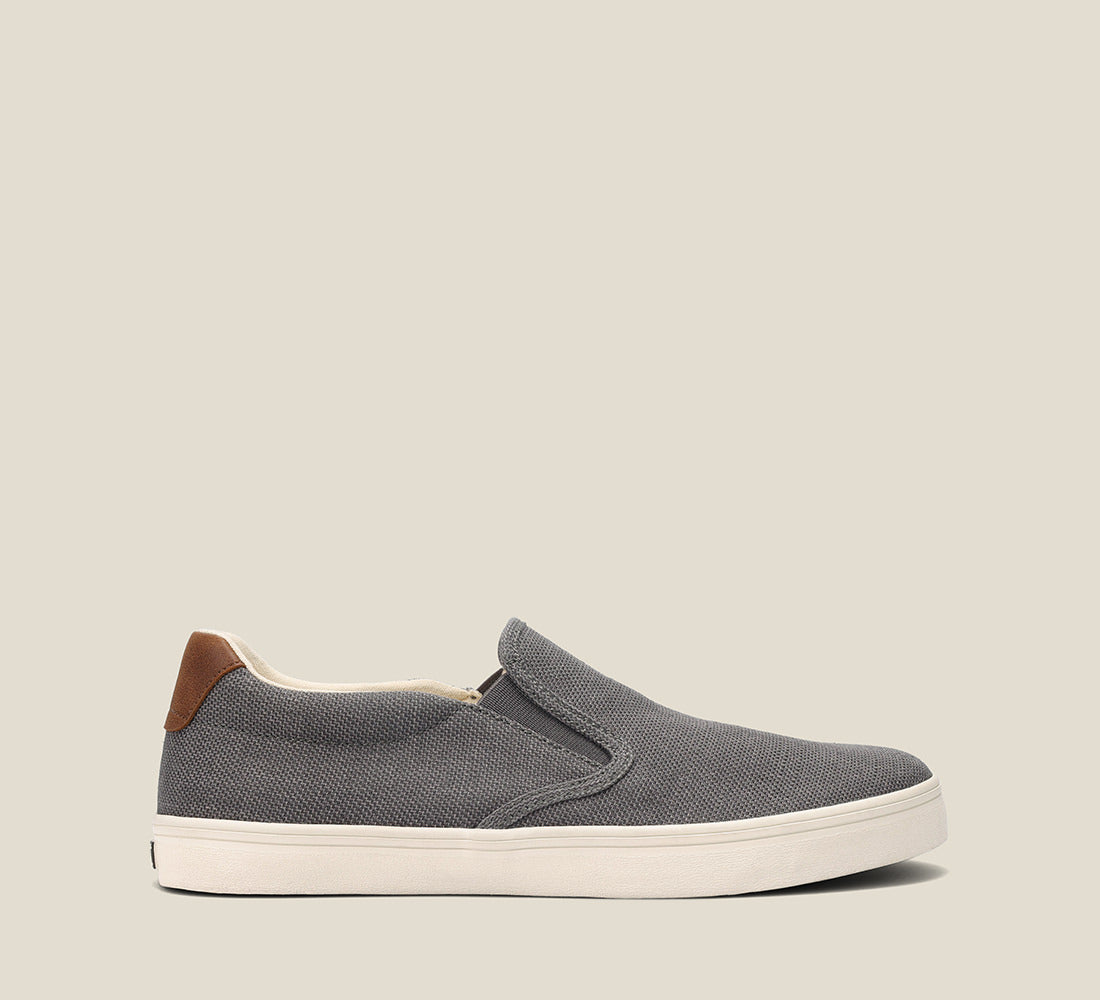 Instep image of Hutch canvas sneaker featuring a polyurethane removable footbed with rubber outsole