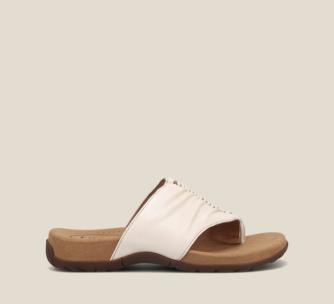 side Angle of Gift 2 White leather sandal with microfiber footbed and rubber outsole