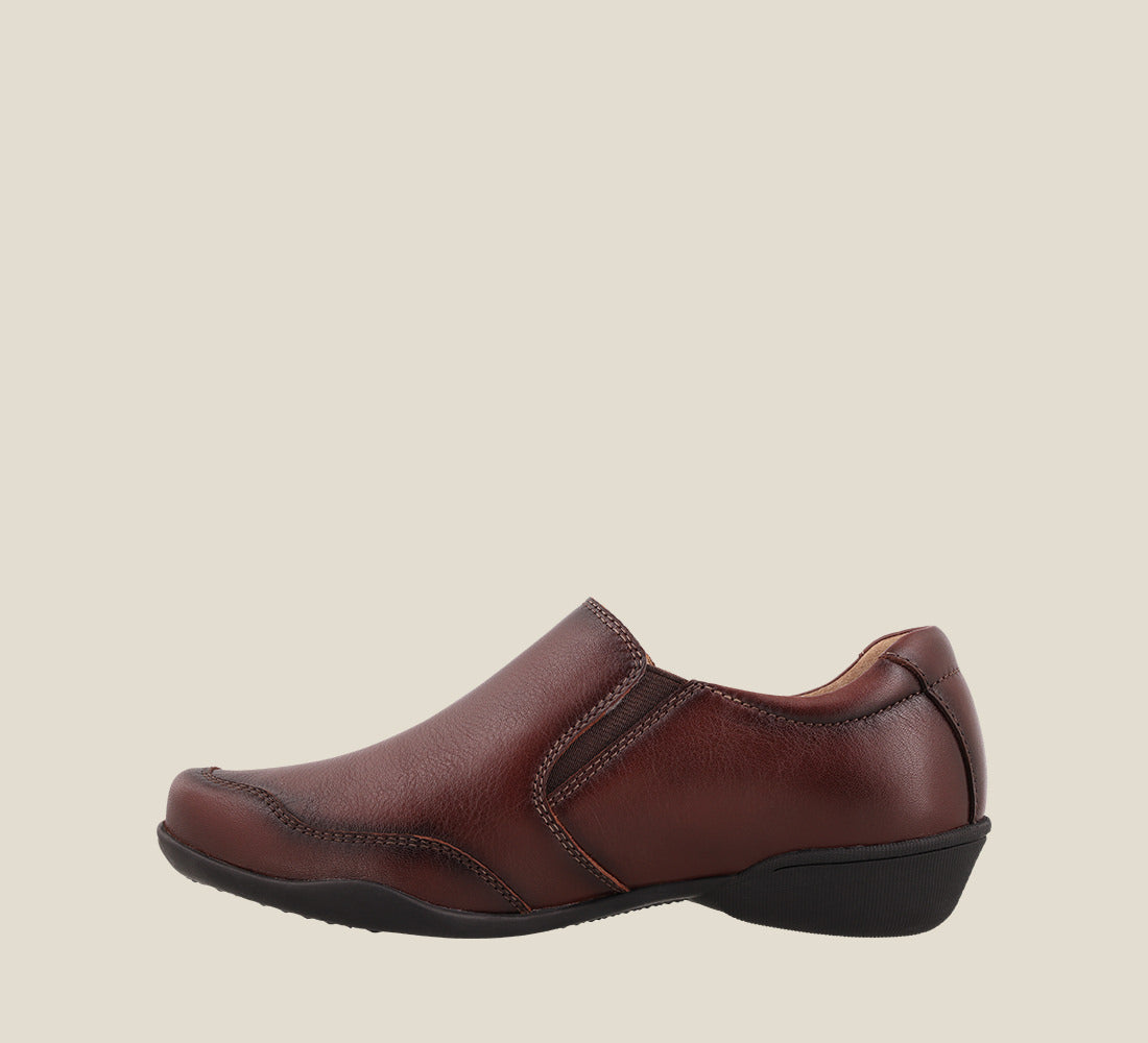 Instep of Encore Whiskey Casual leather step-in shoe with medial gore & bungie closures & a removable footbed. 6