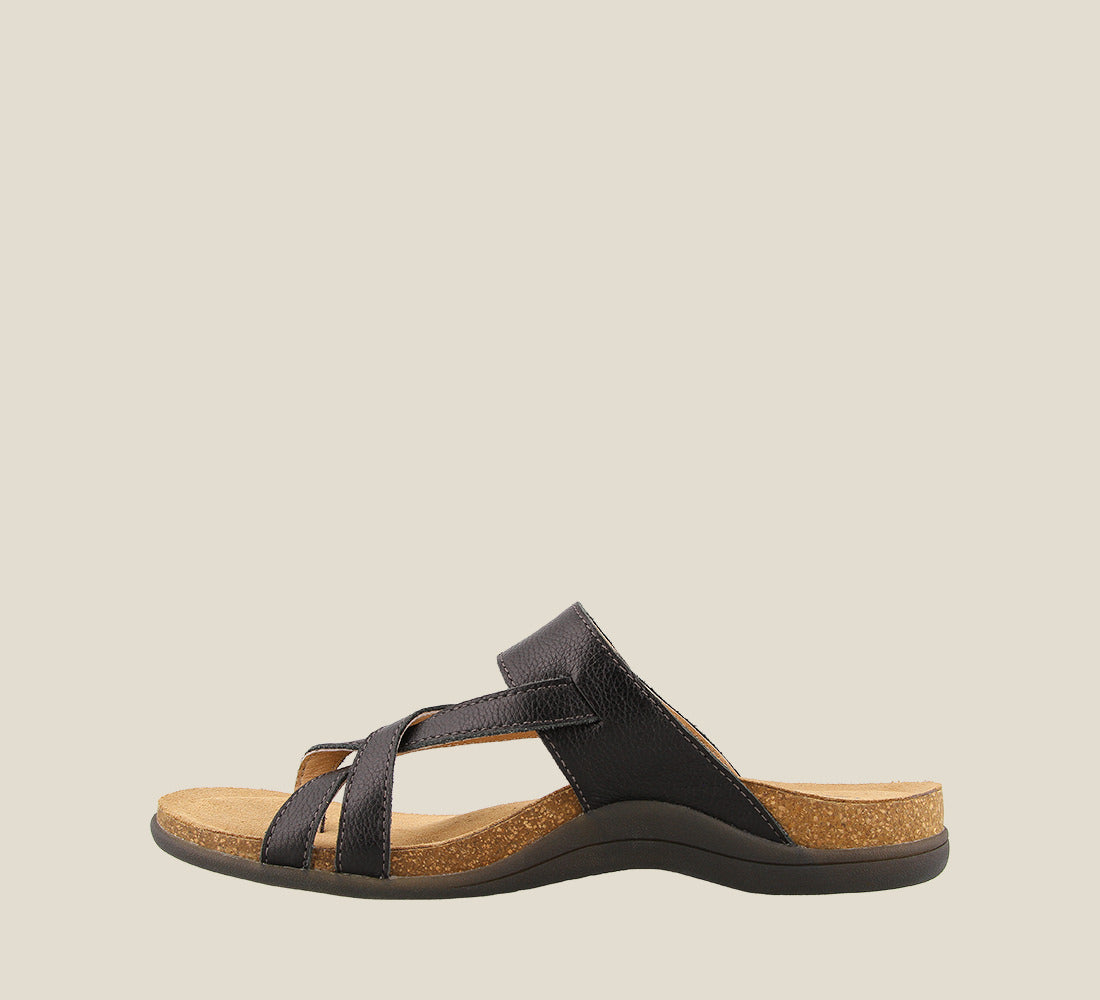 Inside angle of Perfect Black Slide sandal on our cork footbed featuring an adjustable strap and rubber outsole. - size 6