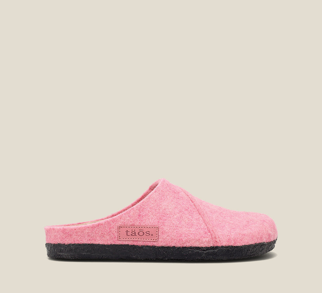 "Side image of Wooled Class Pink clog with featuring a removable footbed with arch & metatarsal support, & TR outsole."